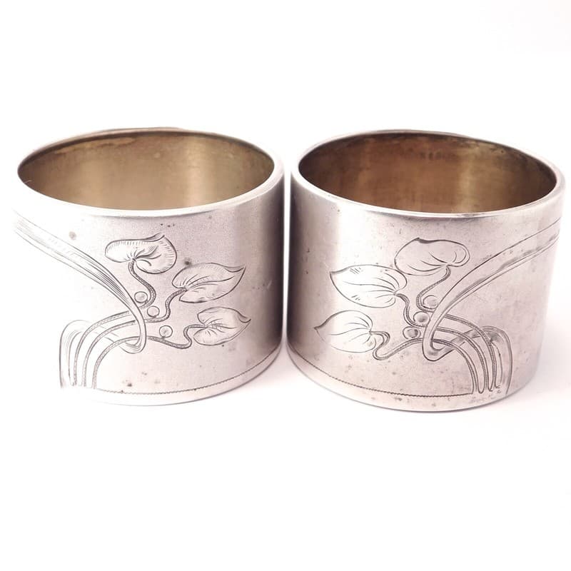 PAIR OF ARTS AND CRAFTS 800 SILVER NAPKIN RINGS