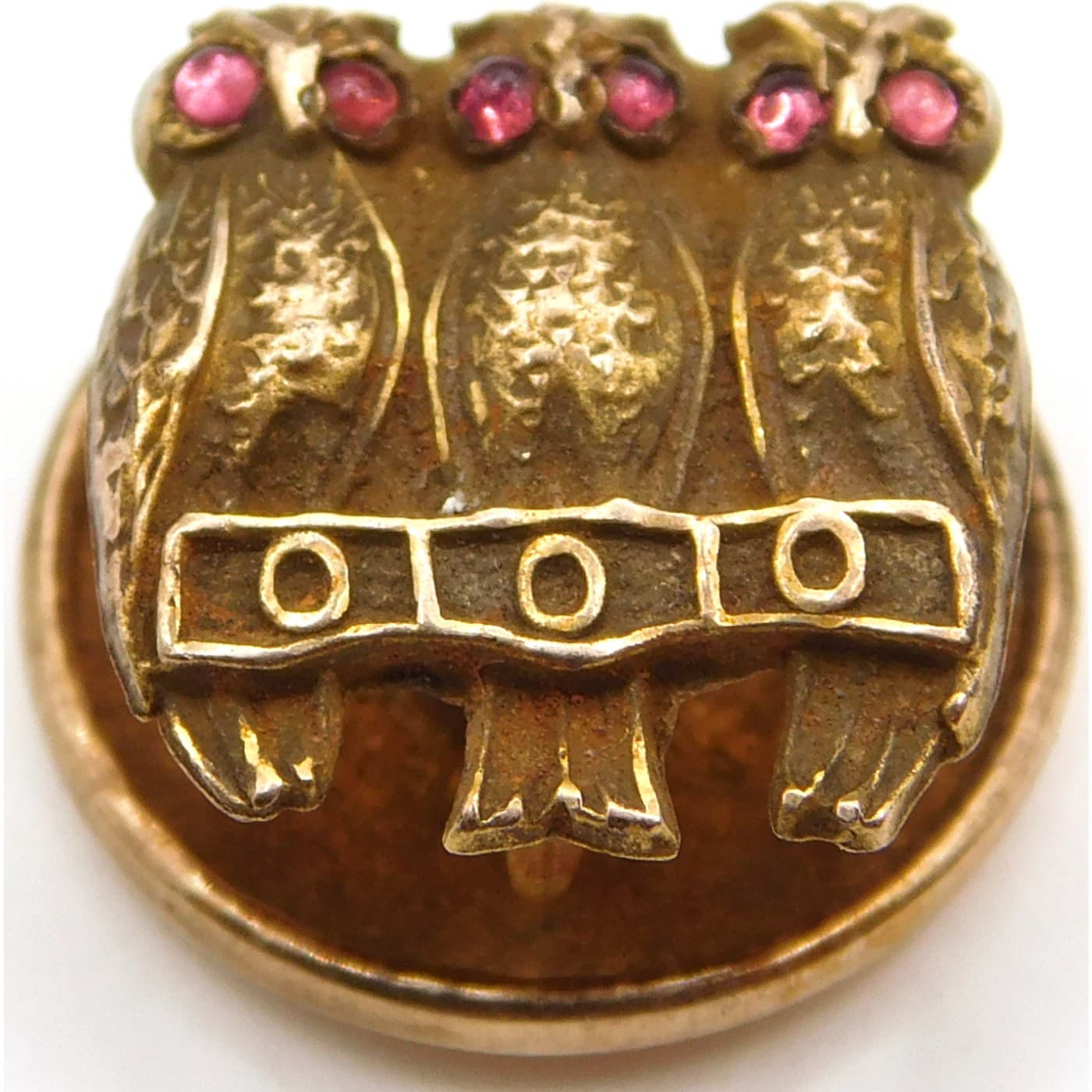 THREE WISE OWLS ANTIQUE BRASS FIGURAL PIN WITH RUBY RED PASTE EYES