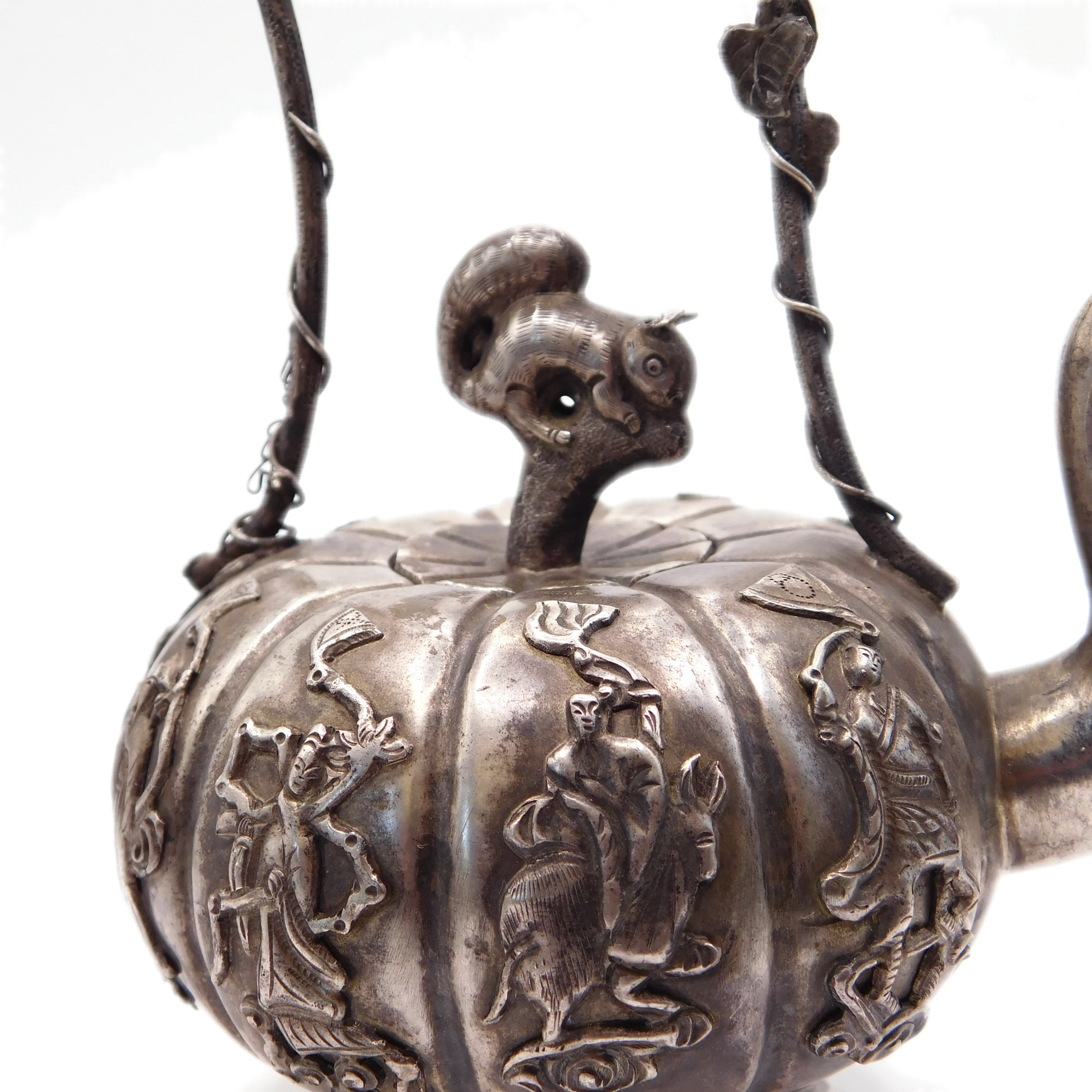 ANTIQUE CHINESE EXPORT SILVER REPOUSSÉ MELON-FORM TEAPOT WITH IMMORTALS