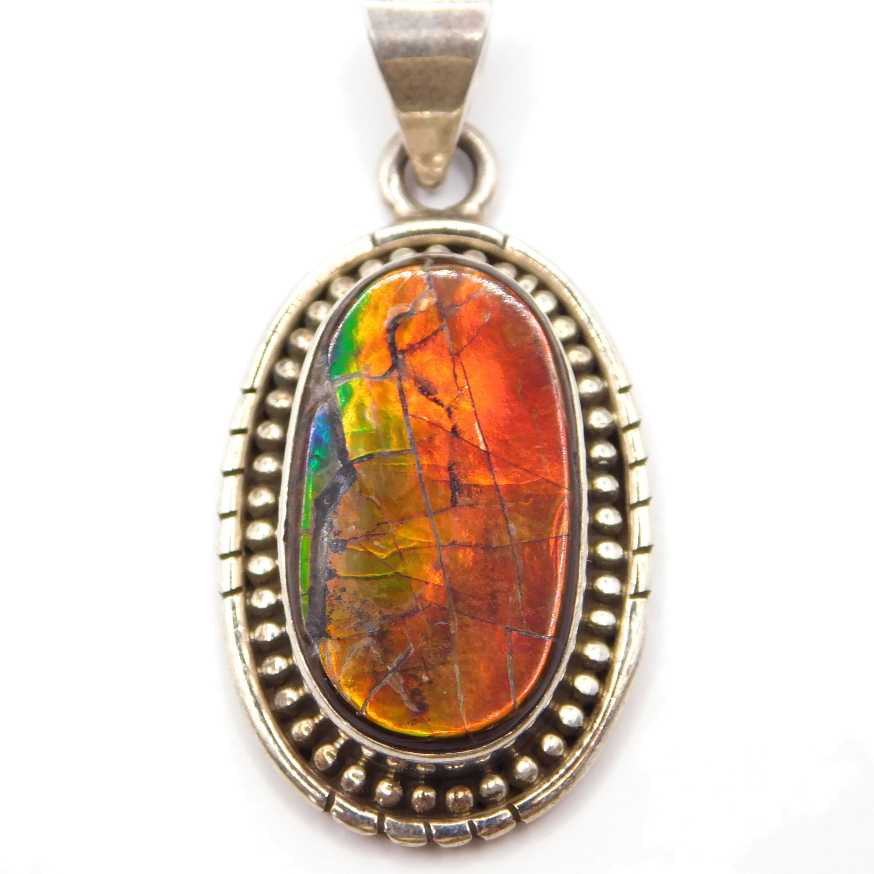 FIERY AMMOLITE STERLING SILVER OVAL PENDANT WITH BEADED HALO, 6+ CTS