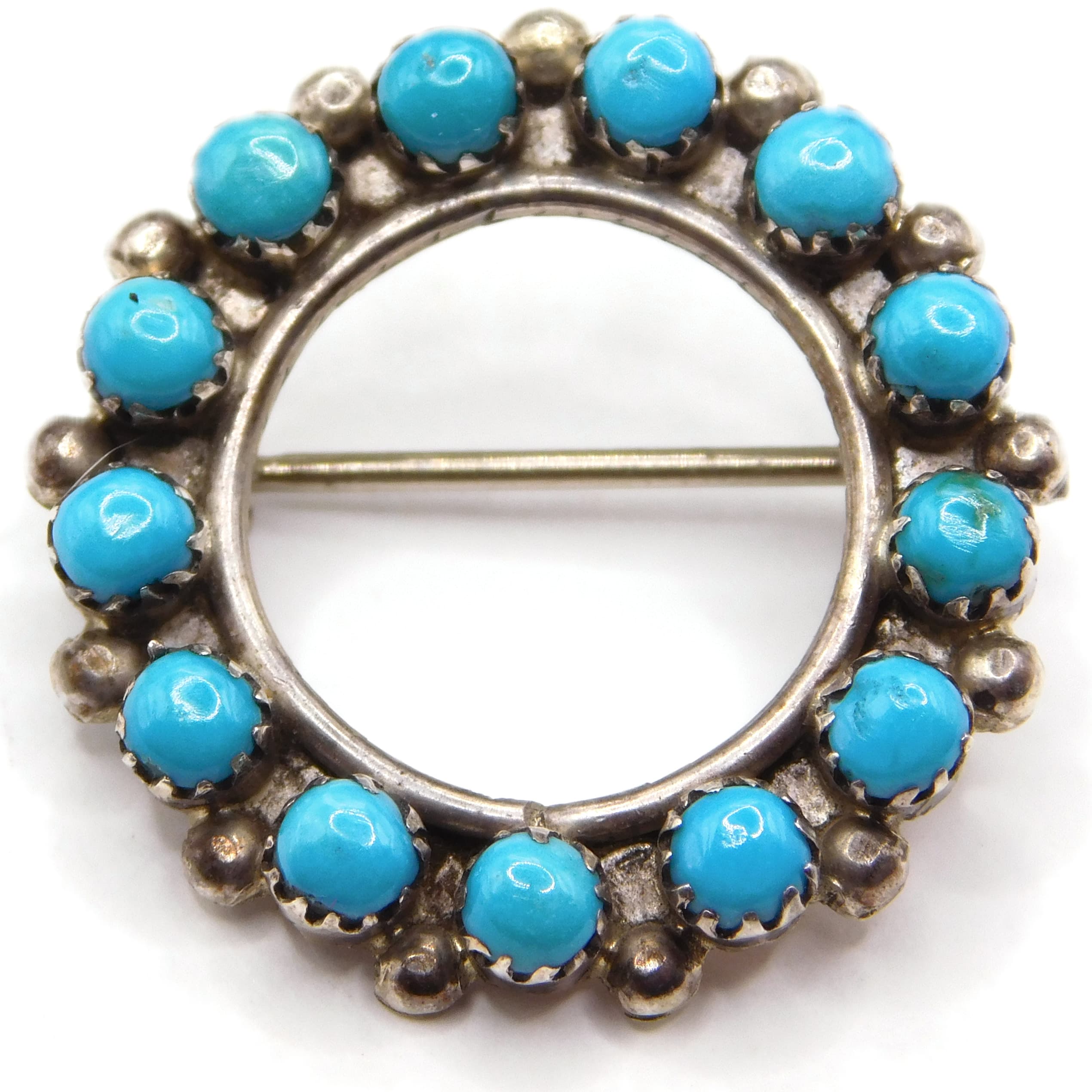 CHARMING TURQUOISE SNAKE-EYE CIRCLE PIN IN SILVER, ZUNI STYLE PETIT POINT