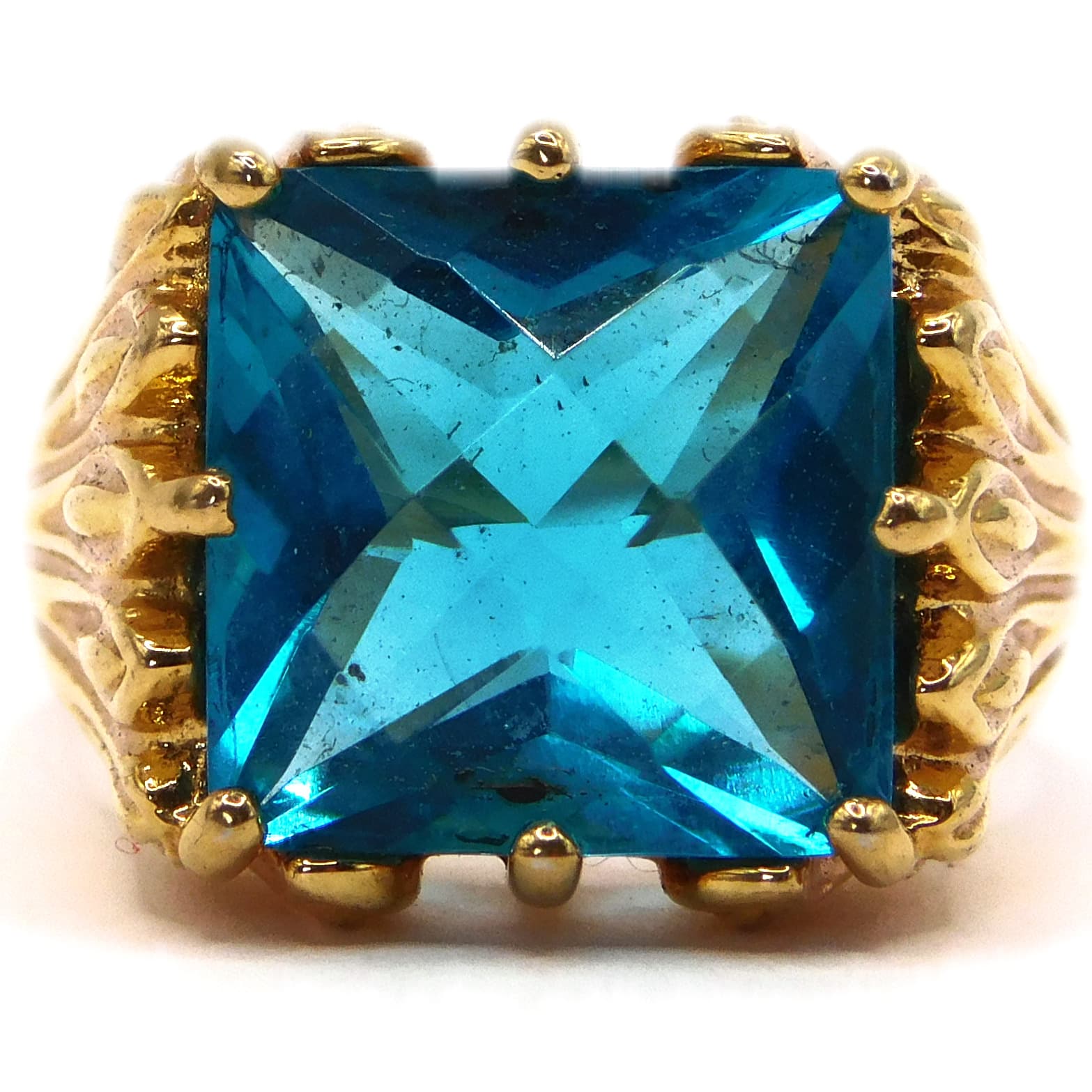 RADIANT BLUE TOPAZ STERLING VERMEIL COCKTAIL RING WITH FLAME-STYLE SETTING